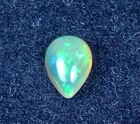 โอปอลธรรมชาติหลากสี 0.46cts 7x5มม 0.46cts natural multi color play opal 7x5mm