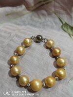 สร้อย​ข้อมือ​มุก​น้ำเค็ม​ทรง​กลมสีเหลืองทอง ความยาว 7 นิ้ว (golden sea pearls, round shape, 7 inch long)​