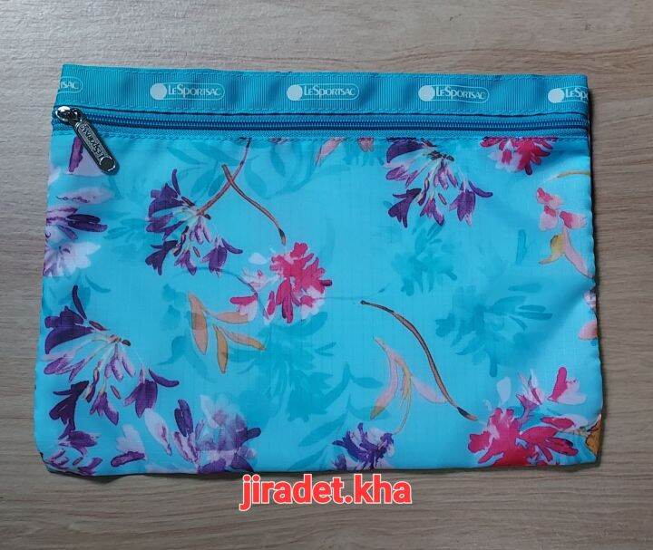 กระเป๋าผ้า-lesportsac-สีฟ้าสดใส-ขนาดกระเป่า-28-21-cm-มีซิปรูดปิดเปิด-บรรจุในแพ็คเก็ต-เป็นสินค้าใหม่-คัดมาจากโกดังสินค้าญี่ปุ่น