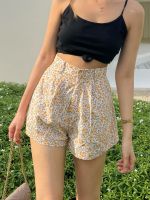 Floral shorts.