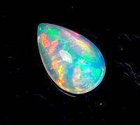 โอปอลหลากสีธรรมชาติ 0.78 กะรัต ลูกแพร์ 9x5 มม 0.78cts natural multi color play opal 9x5mm pear