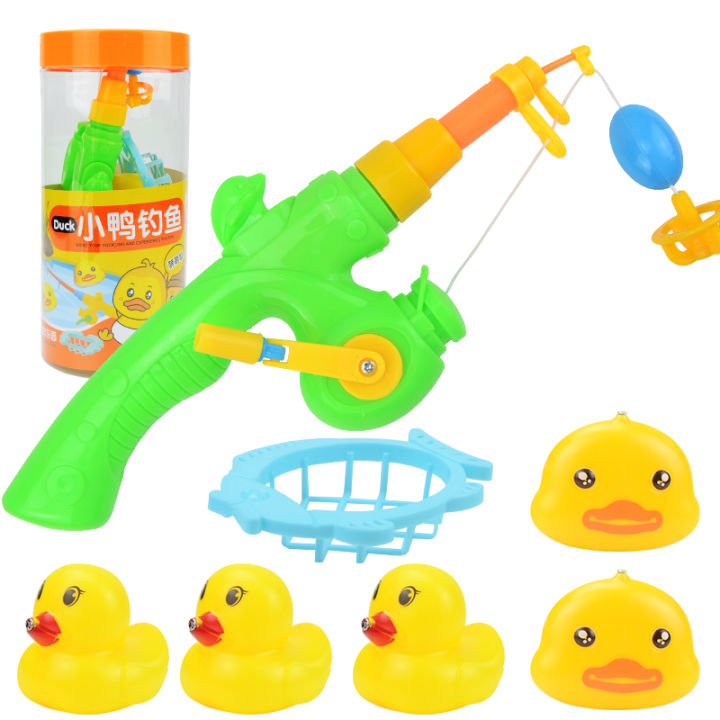 Rubber ducks with a net and a fishing rod - . Gift Ideas