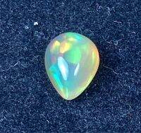 โอปอลหลากสีธรรมชาติ 0.78 กะรัต ลูกแพร์ 8x6 มม 0.78cts natural multi color play opal 8x6mm pear