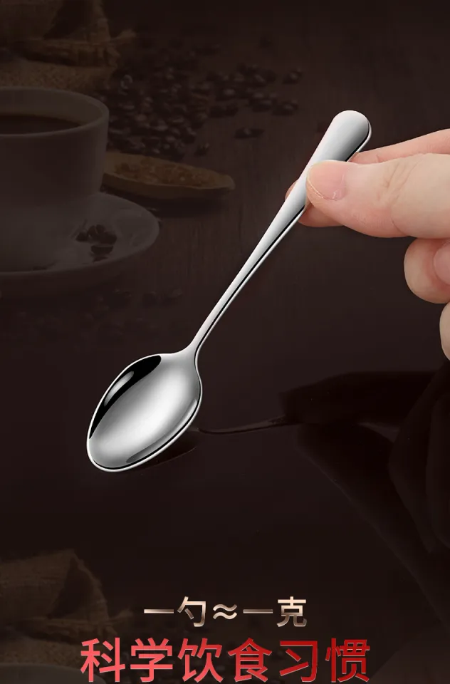 Clean shiny metal spoon isolated on white. Stainless steel small kitchen  dessert teaspoon cut close up. Tablespoon. Kitchen utensils concept. Set of  realistic spoons from different points of view Stock Photo by ©