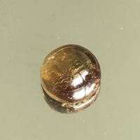 andalusite cabochon 3.13 cts, 8.3x5.3 mm, round shape 100% natural gemstone.    อันดาลูไซต์ เจียรหลังเบี้ย 3.13 กะรัต, 8.3x5.3 มม. ทรงกลม พลอยธรรมชาติ 100%