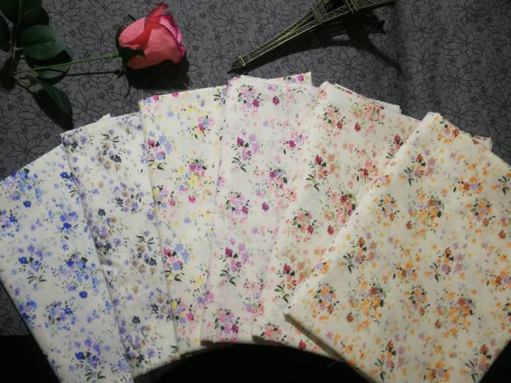 ผ้าคอตตอน-ทีซี-ลดล้างสต๊อค-ลายดอกไม้สามสี