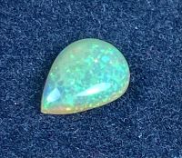 โอปอลหลากสีธรรมชาติ 0.81cts 9x7mm 0.81cts natural multi color play opal 9x7mm