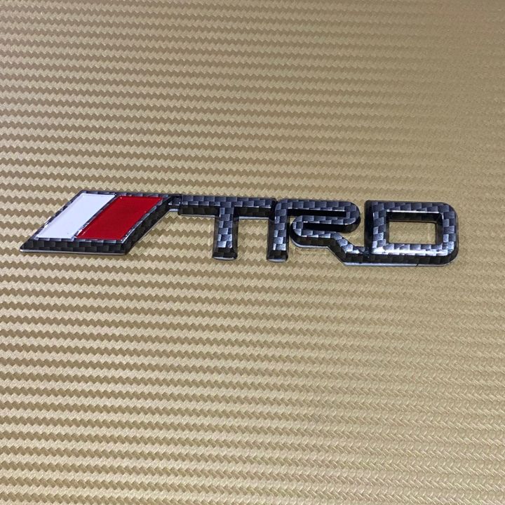 โลโก้-trd-ลายเคฟล่า-ขนาด-2-5-x-15-cm-ราคาต่อชิ้น