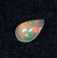 โอปอลหลากสีธรรมชาติ 0.41 กะรัต ลูกแพร์ 7x5 มม 0.41cts natural multi color play opal 7x5mm pear