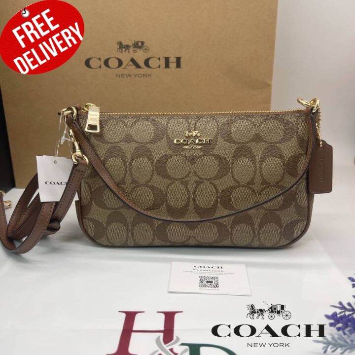 กระเป๋าสะพาย Coach F58321 Top Handle Pouch In Signature Canvas Lazada