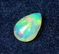 โอปอลหลากสีธรรมชาติ 0.96 กะรัต ลูกแพร์ 9x6 มม 0.96cts natural multi color play opal 9x6mm pear