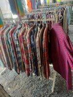 เสื้อลายเเขนยาง