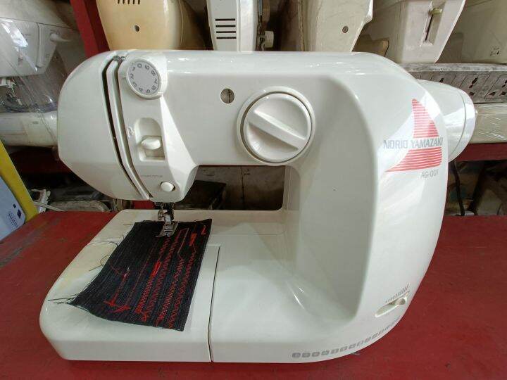 sewing machine japan surplus japan made.automatic pushbutton operate 12