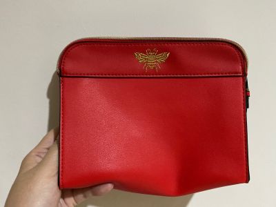 Estee Lauder cosmetic bag  กระเป๋าสวยหรู ดูแพง ลายเสือด้านใน มีผึ้งน้อยห้อยที่ซิป ขนาดกว้าง8"สูง6"ขยายล่างได้2"