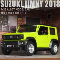 Model Suzuki jimny สเกล 1:26 มี 2 สี บอดี้เหล็ก ล้อยาง ประตูหน้าเปิดได้ มีไฟหน้า หลัง มีเสียง งานคุณภาพดี