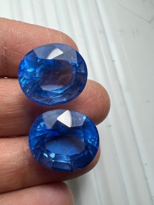 บลูโทพาสย BLUE TOPAZ CULTURE STONE พลอย100% LAB MADE กะรัต 13X15 มิลลิเมตร..(2 เม็ด) MM รูปไข่ สะอาดตา 27 กะรัต