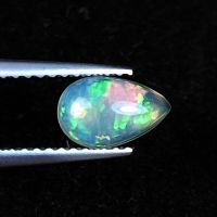 โอปอลหลากสีธรรมชาติ 0.50cts ลูกแพร์ 8x5mm 0.50cts natural multi color play opal 8x5mm pear