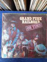 LPBOX 33 : GRAND FUNK : RAILROAD : ON TIME : แผ่นเสียงสภาพพร้อมฟัง แผ่นนักสะสม ปกดูเก่า lp 33 rpm 12"  มีเสียงก๊อบแก๊บ มีรอยบางๆ ได้รับการตรวจสอบครับ