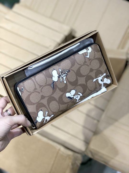 COACH X PEANUTS LONG ZIP AROUND WALLET IN SIGNATURE CANVAS WITH SNOOPY  PRINT 