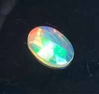 โอปอลเล่นสีธรรมชาติ 0.86cts 10.8x7.4x2.3mm 0.86cts natural color play opal 10.8x7.4x2.3mm