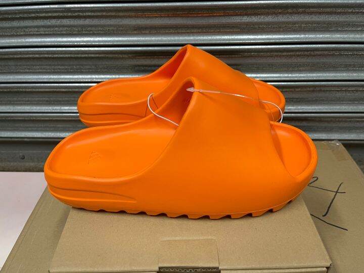 orange yeezy slides women