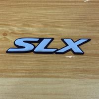 โลโก้* คำว่า SLX ติดข้าง ISUZU สีเงินขอบดำ ( ขนาด* 3 x 16 cm ) ราคาต่อชิ้น