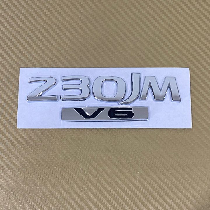 โลโก้-230jm-v6-ติดท้าย-nissan-ตัวอักษรแยก-ขนาด-4x13-cm-ราคาต่อชิ้น