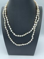 Natural pearl long necklace.