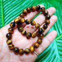 สร้อยข้อมือหินมงคลTiger Eye หินพลอยตาเสือ บูชาเสริมมงคลปรับสมดุลธาตุในร่างกาย สร้อยข้อมือสามารถยืดขยายได้ตามรอบแขนของผู้สวมใส่ ผ่านพิธีพุทธาภิเษกแล้วหลายวาระ เป็นวัตถุมงคลที่มีอานุภาพและความพิเศษในตัวอยู่แล้ว