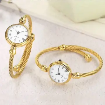 Gold bangle watch outlet ladies