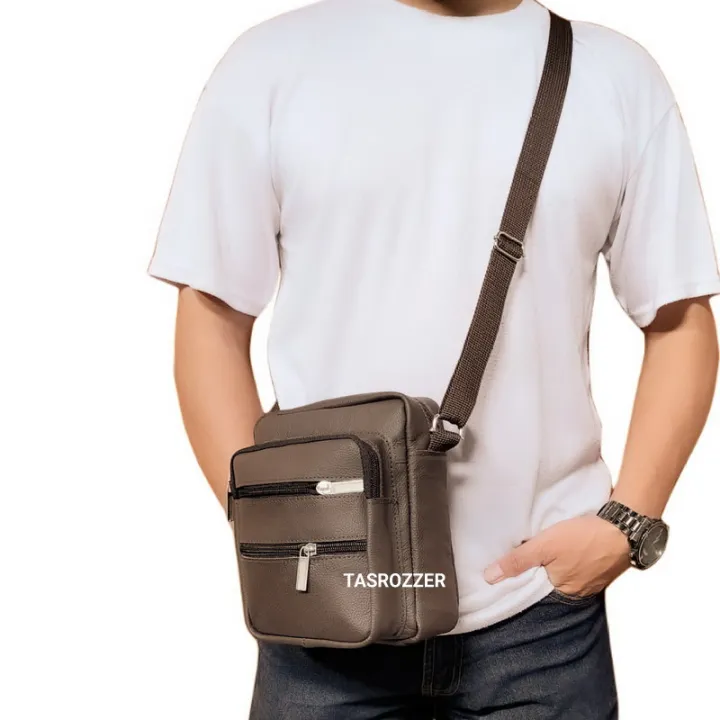 Tas selempang pria kulit asli model banyak saku polos | Lazada Indonesia