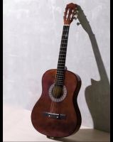 กีต้าร์อะคูสสติคสำหรับผู้เริ่มเล่นในขั้นต้น Acoustic guitar (Size40x96x15cm)