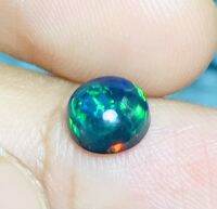 0.61cts โอปอลดำ 6มม. ทรงกลม 1 ชิ้น 0.61cts black opal 6mm round 1 piece