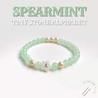 BASE ON YOU - Tiny stone alphabet : SPEARMINT (กำไลข้อมือหินนำโชค)