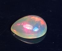 โอปอลเล่นสีธรรมชาติ 0.63cts 7x5mm 0.63cts natural color play opal 7x5mm