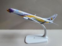 โมเดลเครื่องบินเหล็ก Boeing 737 นกแอร์ (ขาว) (ยาวประมาณ16cm) พร้อมฐานตั้ง