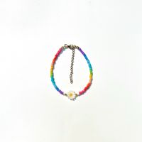 daintyme - Somewhere Over the Rainbow bracelet กำไลข้อมือลูกปัดแฮนเมด handmade จี้มุกดอกเดซี่ ธีมสดใสสายรุ้ง ทะเล