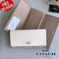 กระเป๋าสตางค์ใบยาว COACH SLIM TRIFOLD WALLET IN SIGNATURE CANVAS