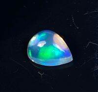 โอปอลหลากสีธรรมชาติ 0.88cts ลูกแพร์ 8x6.5มม 0.88cts natural multi color play opal 8x6.5mm pear