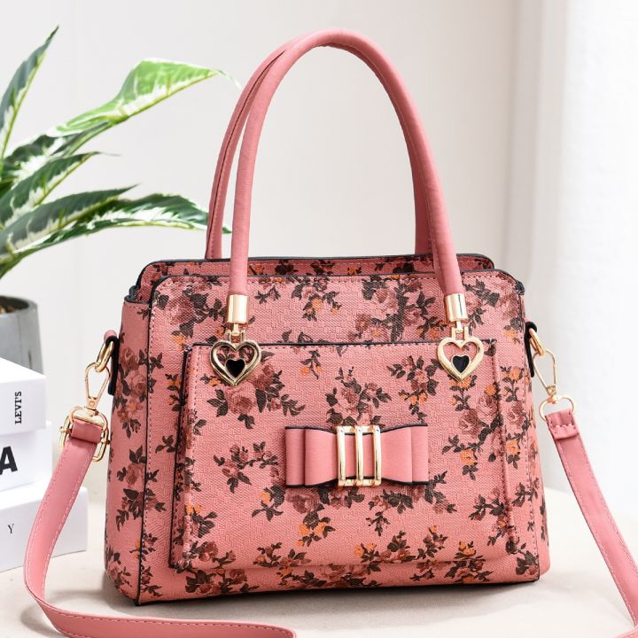 bag-lady-in-the-summer-of-2021-the-new-tide-of-large-capacity-fashion-printed-his-mother-baochun-bowknot-middle-aged-female-bag