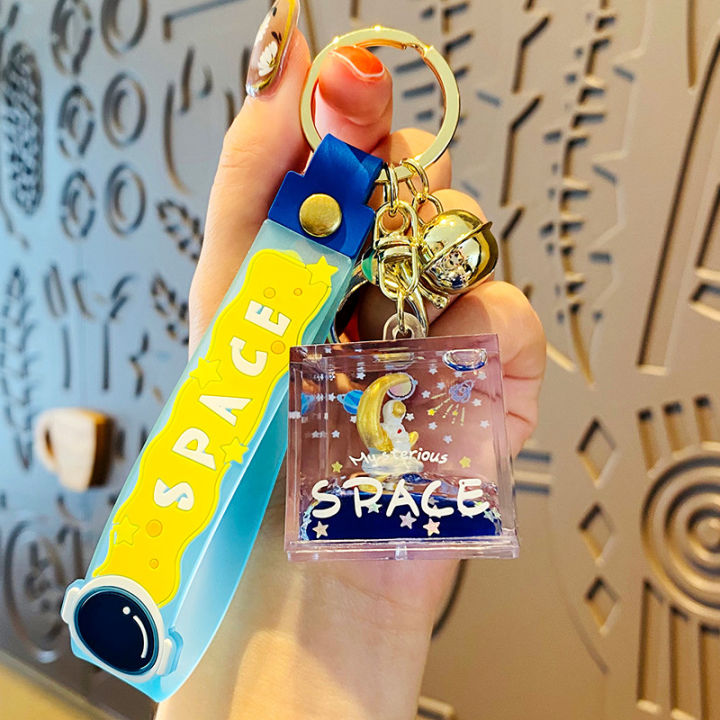 น้ำมันบรรจุลอยดูดสแควร์นักบินอวกาศขวดการ์ตูนน่ารักพวงกุญแจแฟชั่นรถพวงกุญแจแหวนกระเป๋าจี้