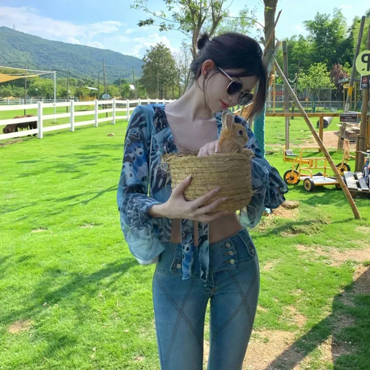 Eastko 2022ใหม่สไตล์ผู้หญิงท็อปส์สำหรับฤดูร้อนความรู้สึกสูงสีฟ้าพิมพ์เสื้อเครื่องเทศสาวฝูงชนขนาด