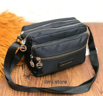 Harga tas longchamp sling bag sale