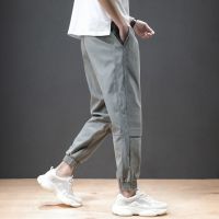 Age season casual pants men loose beam foot fashion students nine points popular logo joker movement joker pants men tide