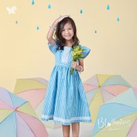 Girl Butterfly Dress เดรสเด็กหญิงโทนสีฟ้าต้อนรับวันแม่ จากคอตตอน 100% ทอพิเศษให้มีกระจุกด้ายแทรกในเนื้อผ้า ทอลายทาง ให้ลุคสีสันนุ่มๆ