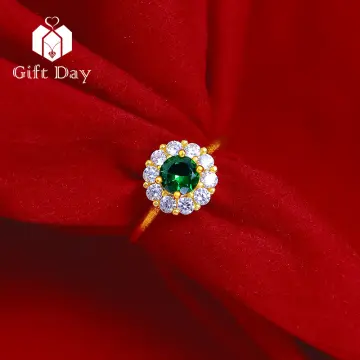 Gold hot sale green ring