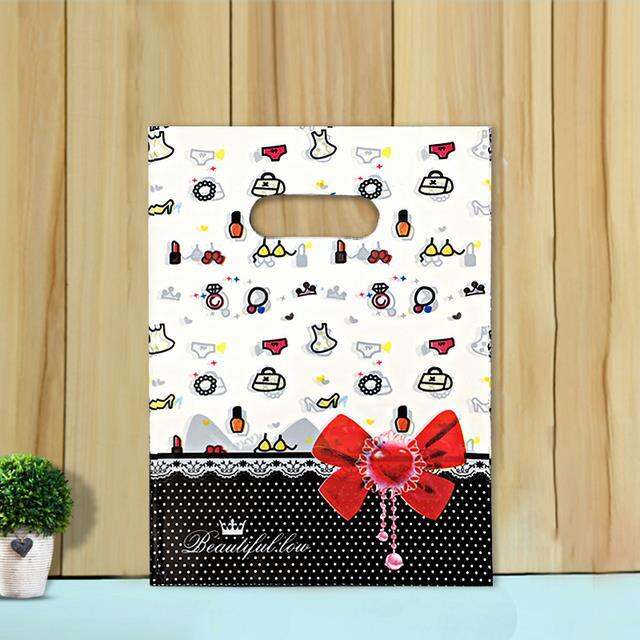 50pcs-15x20cm-20x30cm-small-jewelry-bag-cute-pattern-plastic-bag-with-handle-gift-bags-candy-cookie-party-favor-packaging-bag