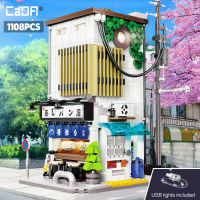 1108 Pcs Cada City LED ญี่ปุ่น Steamed Bun House สถาปัตยกรรมอาคารบล็อก Friends Shop ตัวเลขอิฐของเล่นสำหรับของขวัญเด็ก