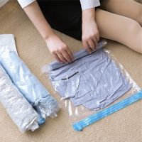 Reusable portable folding hand-rolled compression bag vacuum for travel collection bags