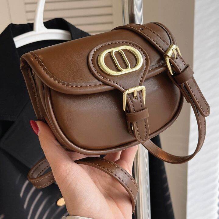 spring-popular-small-bag-female-ins-senior-feeling-inclined-shoulder-bag-2022-new-tide-western-style-restoring-ancient-ways-one-shoulder-saddle-bag